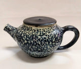Teapot in Broken Traingle
